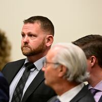 Aurora Police officer Randy Roedema, center, during an arraignment in the Adams County district court at the Adams County Justice Center January 20, 2023.