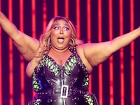 A picture of Lizzo performing. Lizzo has been accused of creating a hostile work environment by allegedly fat shaming and sexually harassing three of her former dancers, according to a lawsuit.