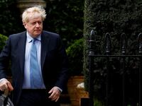 Former British Prime Minister Boris Johnson walks outside his home, in London, Britain, March 22, 2023.