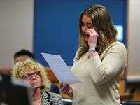 Jenna Ellis reads a statement after Ellis plead guilty to a felony count of aiding and abetting false statements and writings, inside Fulton Superior Court