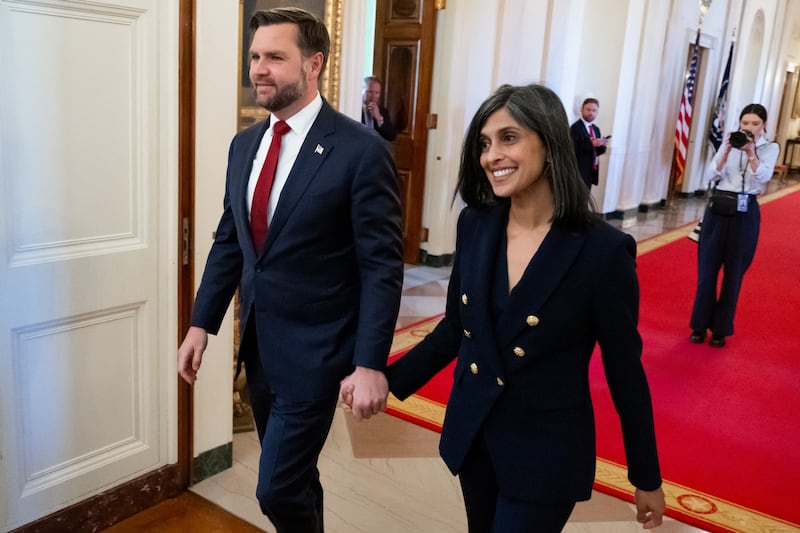 US Vice President JD Vance and Second Lady Usha Vance arrive for President Donald Trump to sign an executive order on foster children and families in the East Room of the White House in Washington, DC, November 13, 2025. The executive order will be focused on supporting foster youth transitioning out of the system to adulthood by expanding and enhancing access to education, workforce and career development, digital resources, and other supports. (Photo by SAUL LOEB / AFP) (Photo by SAUL LOEB/AFP via Getty Images)