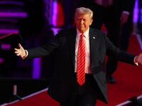 President-Elect Donald Trump walks to the stage at his victory rally in Capital One Arena.