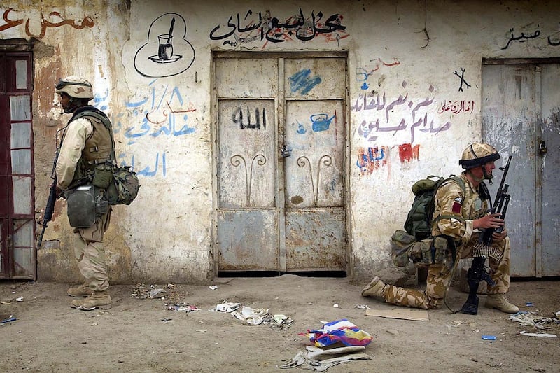 articles/2013/03/19/america-s-lost-decade-in-iraq-a-marine-officer-looks-back/130318-Busch-Iraq-War-embed-01_ynhrws