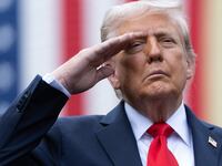 President Donald Trump salutes during the playing of "Taps" at a September 11th observance event in the courtyard of the Pentagon September 11, 2025 in Arlington, Virginia.