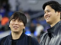 Shohei Ohtani (right) talks with his interpreter Ippei Mizuhara (left).