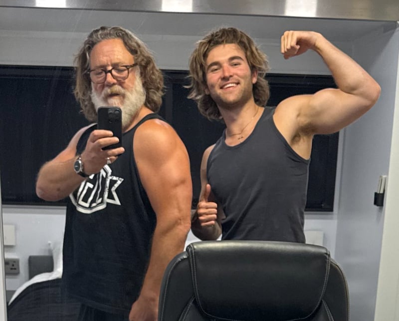 Russell Crowe flexed his muscles in front of a mirror with his 20-year-old son, Tennyson.